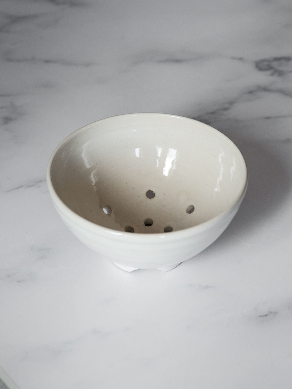 White pottery bowl for berries